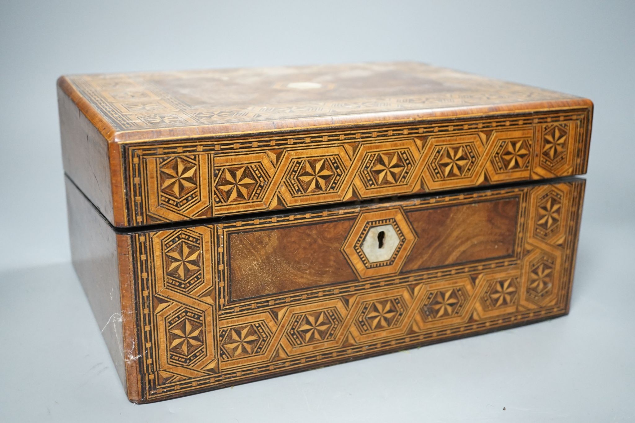 A Victorian inlaid walnut box and a Victorian black lacquer tea caddy, 30cm